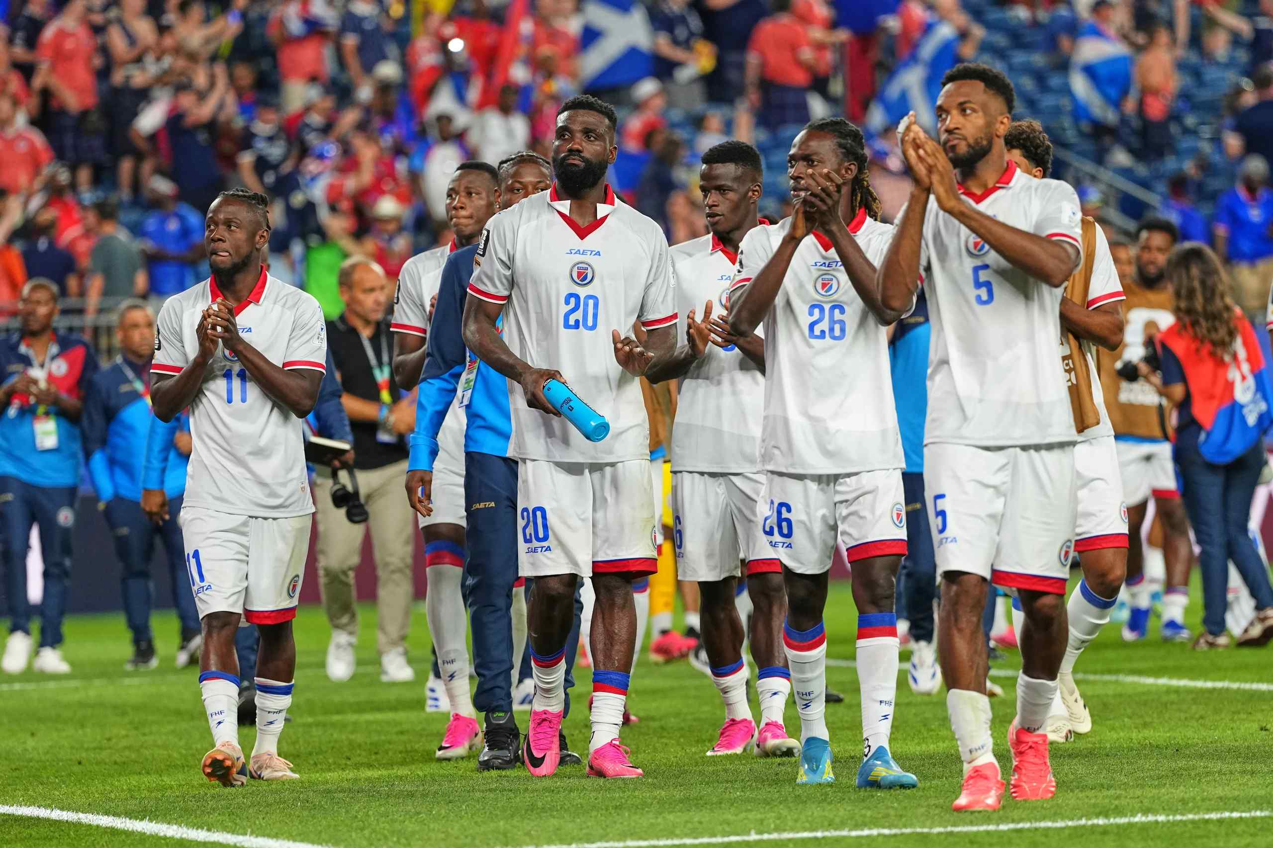 Haiti national football team applauding fans after their 2026 FIFA World Cup Group C
